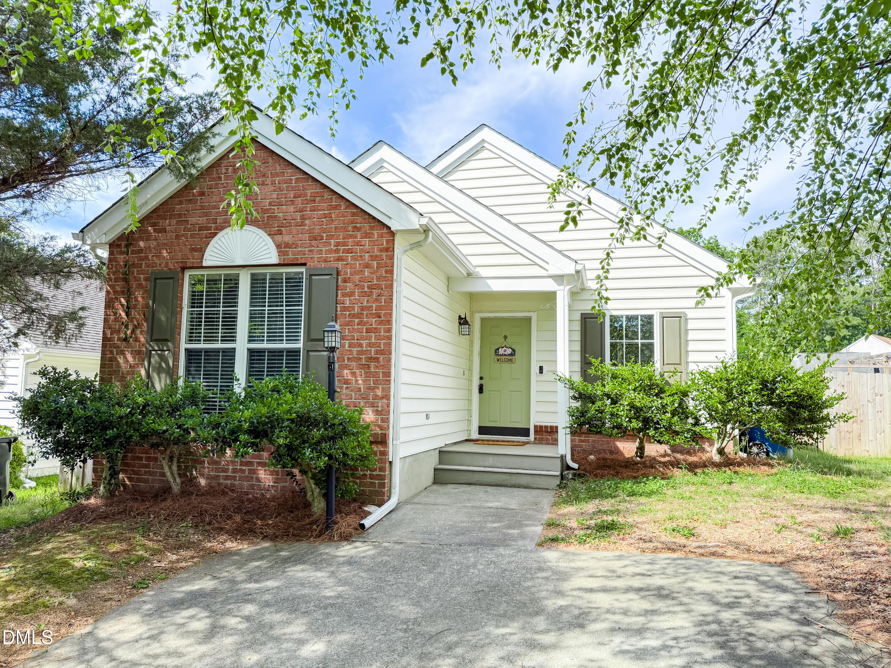 6304 Forest Ridge Drive Durham, NC 27713 - Photo 28 of 29 a front view of a house with garden