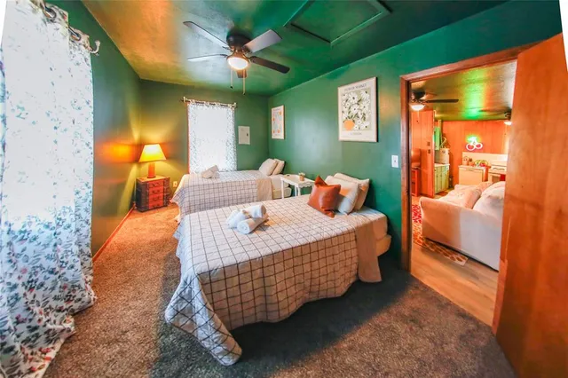 a bed room with a bed and a couch