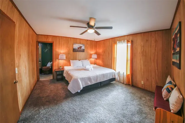 a view of a door and chair in the front of a door