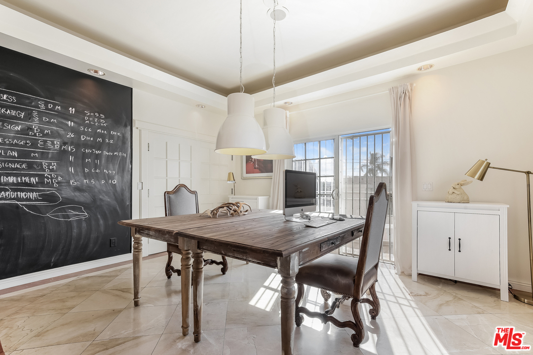 1643 Buckingham Road Los Angeles, CA 90019 - Photo 12 of 26 a view of a dining room with furniture