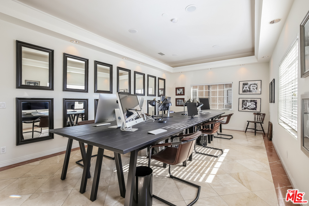 1643 Buckingham Road Los Angeles, CA 90019 - Photo 14 of 26 a view of a dining room with furniture