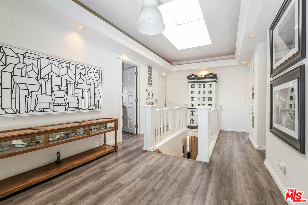 1643 Buckingham Road Los Angeles, CA 90019 - Photo 10 of 26 a view of entryway with wooden floor