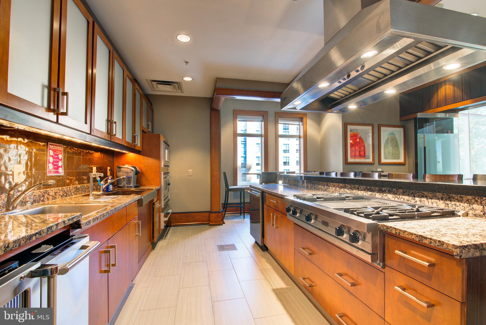 11990 Market Street, Unit 2101 Reston, VA 20190 - Photo 66 of 103 Party room kitchen