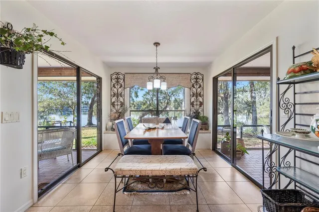 a bathroom with a granite countertop sink a mirror and a shower