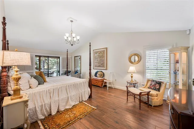 a work room with furniture and ceiling fan