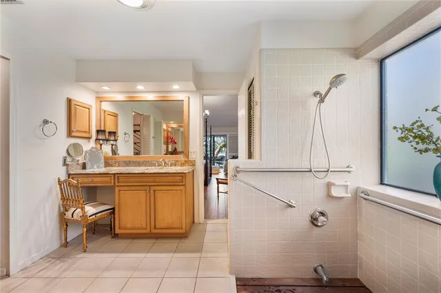 an aerial view of a house with yard