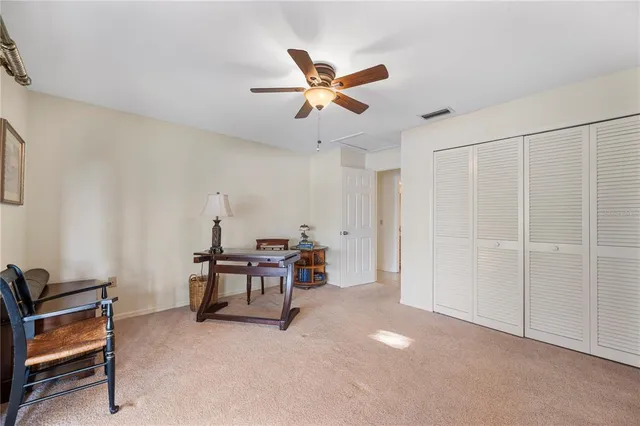 an aerial view of a house with lake view