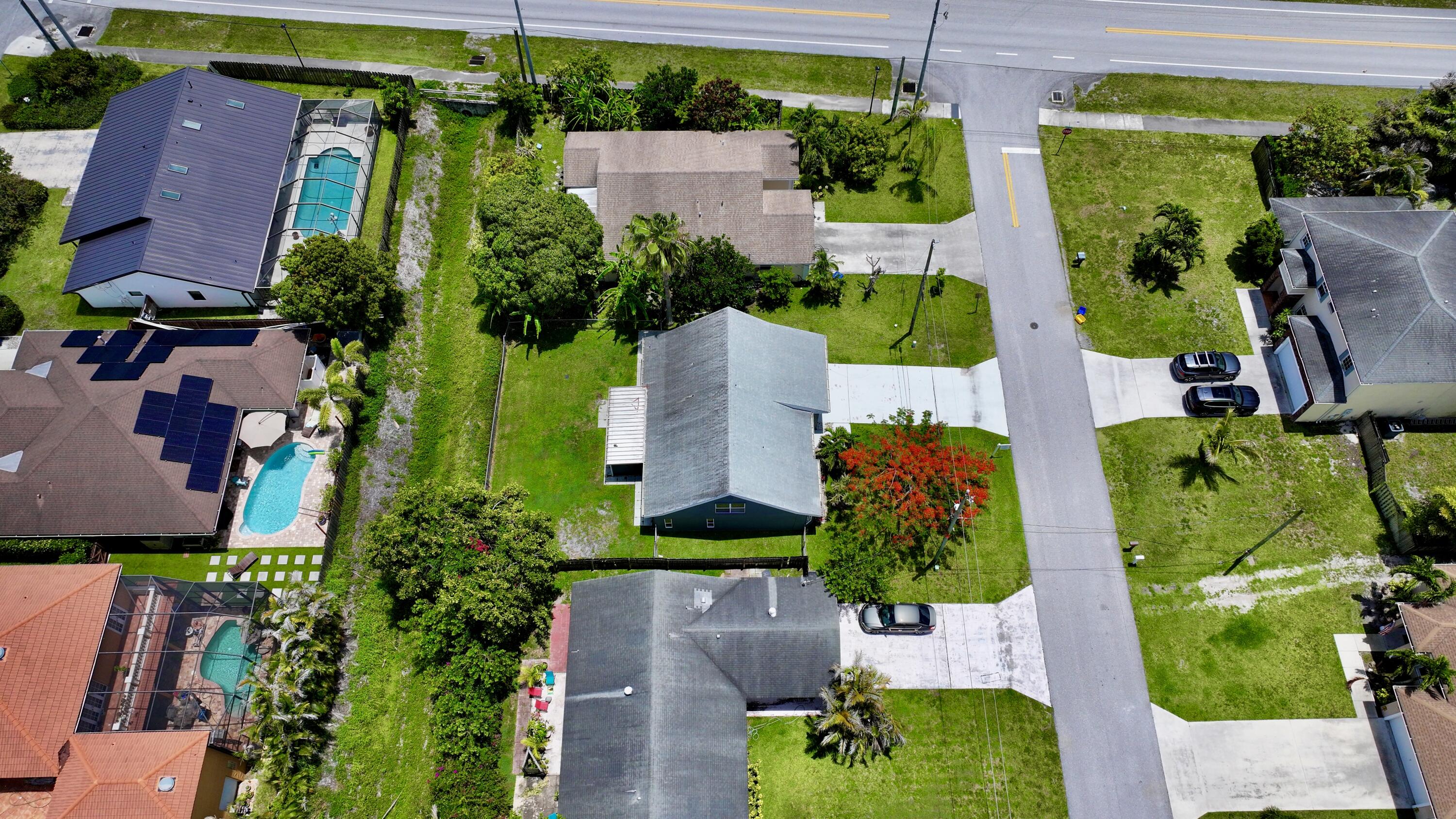 6048 Garrett Street Jupiter, FL 33458 - Photo 94 of 101 dji_fly_20260522_124908_0941_17794719016