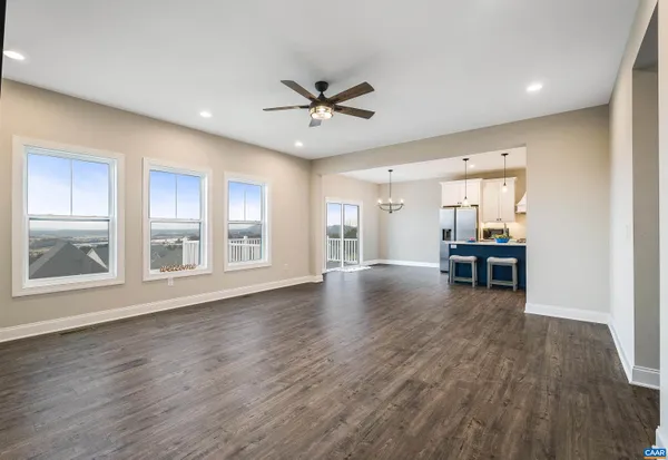 a bathroom with a granite countertop sink mirror and