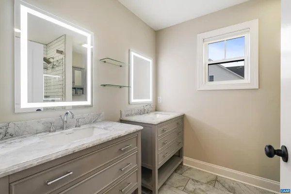 a view of an empty room and closet area