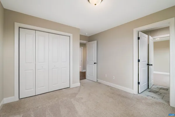 a view of a storage & utility room with wooden floor
