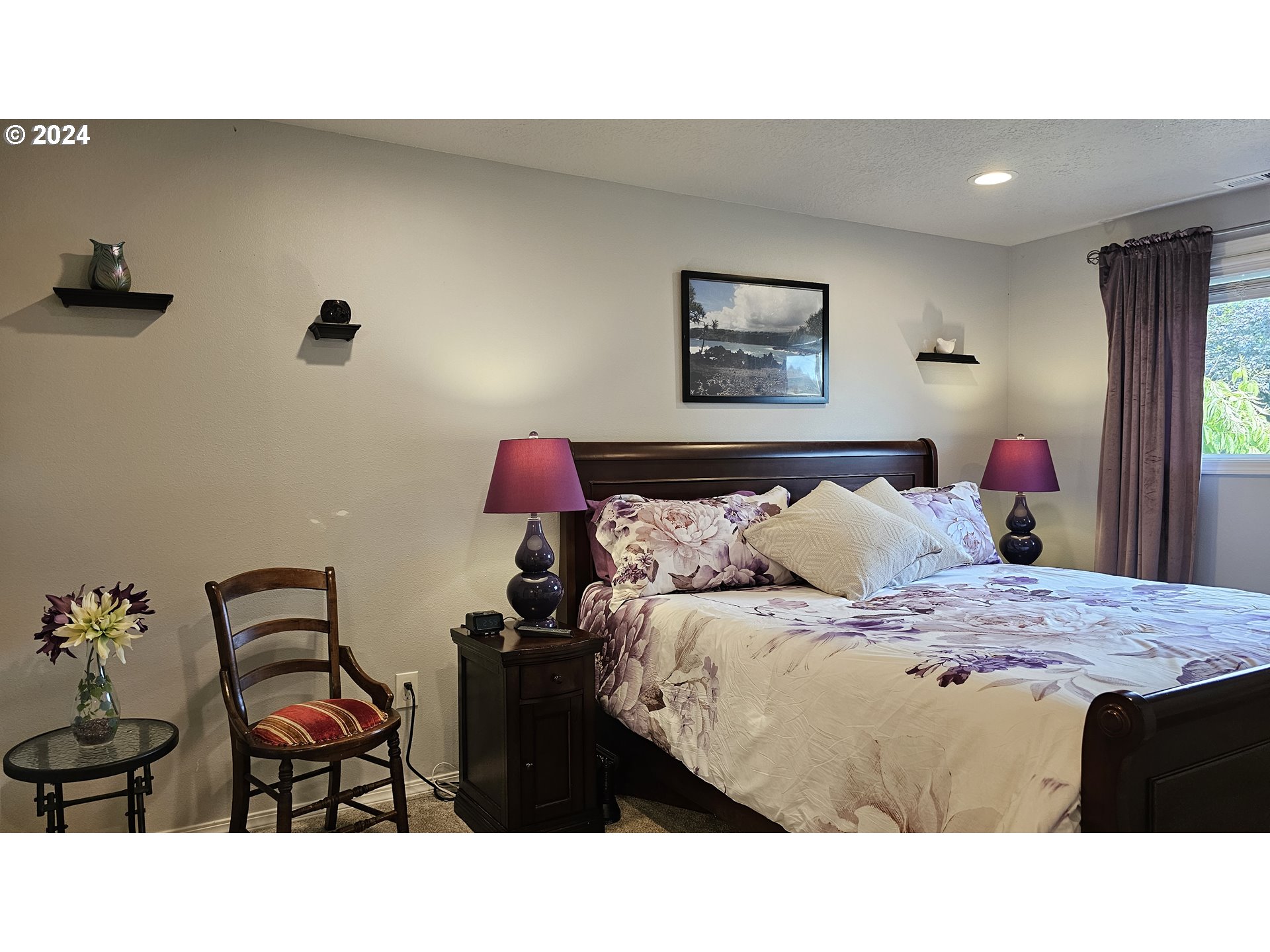 2168 15th Street Springfield, OR 97477 - Photo 17 of 43 a bedroom with a bed and wooden floor