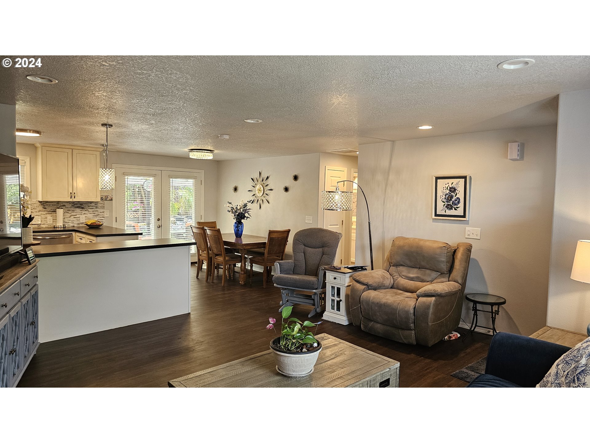 2168 15th Street Springfield, OR 97477 - Photo 6 of 43 a living room with furniture and wooden floor