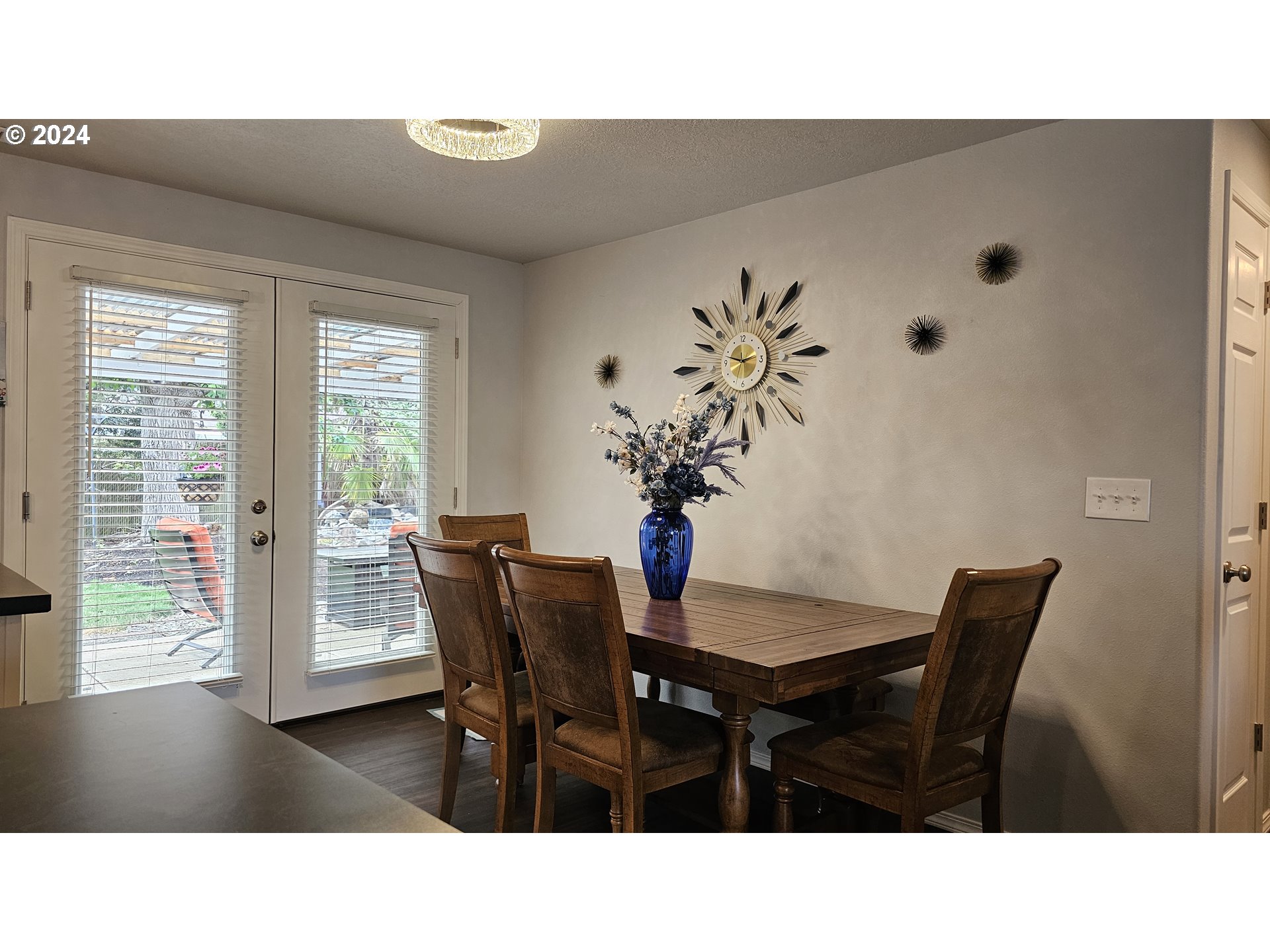 2168 15th Street Springfield, OR 97477 - Photo 8 of 43 a kitchen with a table and chairs in it