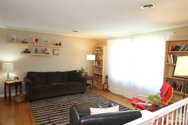 905 Tyrrell Road Raleigh, NC 27609 - Photo 2 of 13 a living room with furniture and a couch