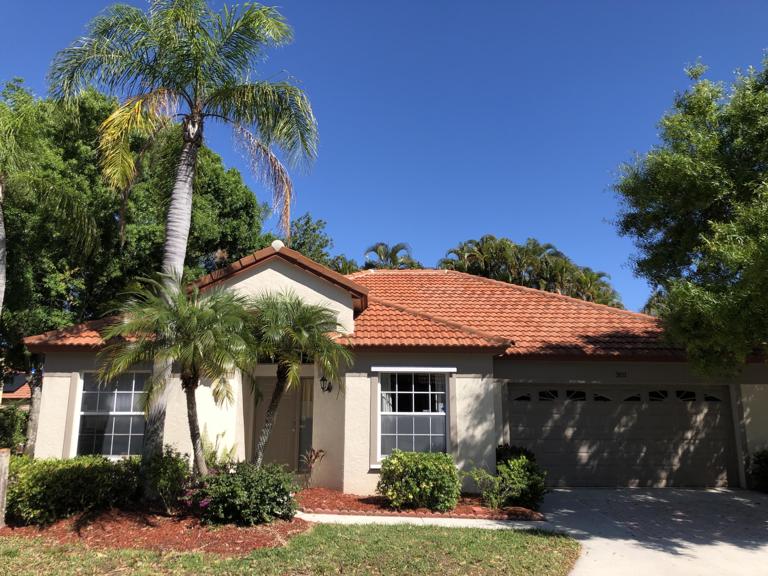 3121 Contego Lane Riviera Beach, FL 33418 - Photo 1 of 20 FRONT