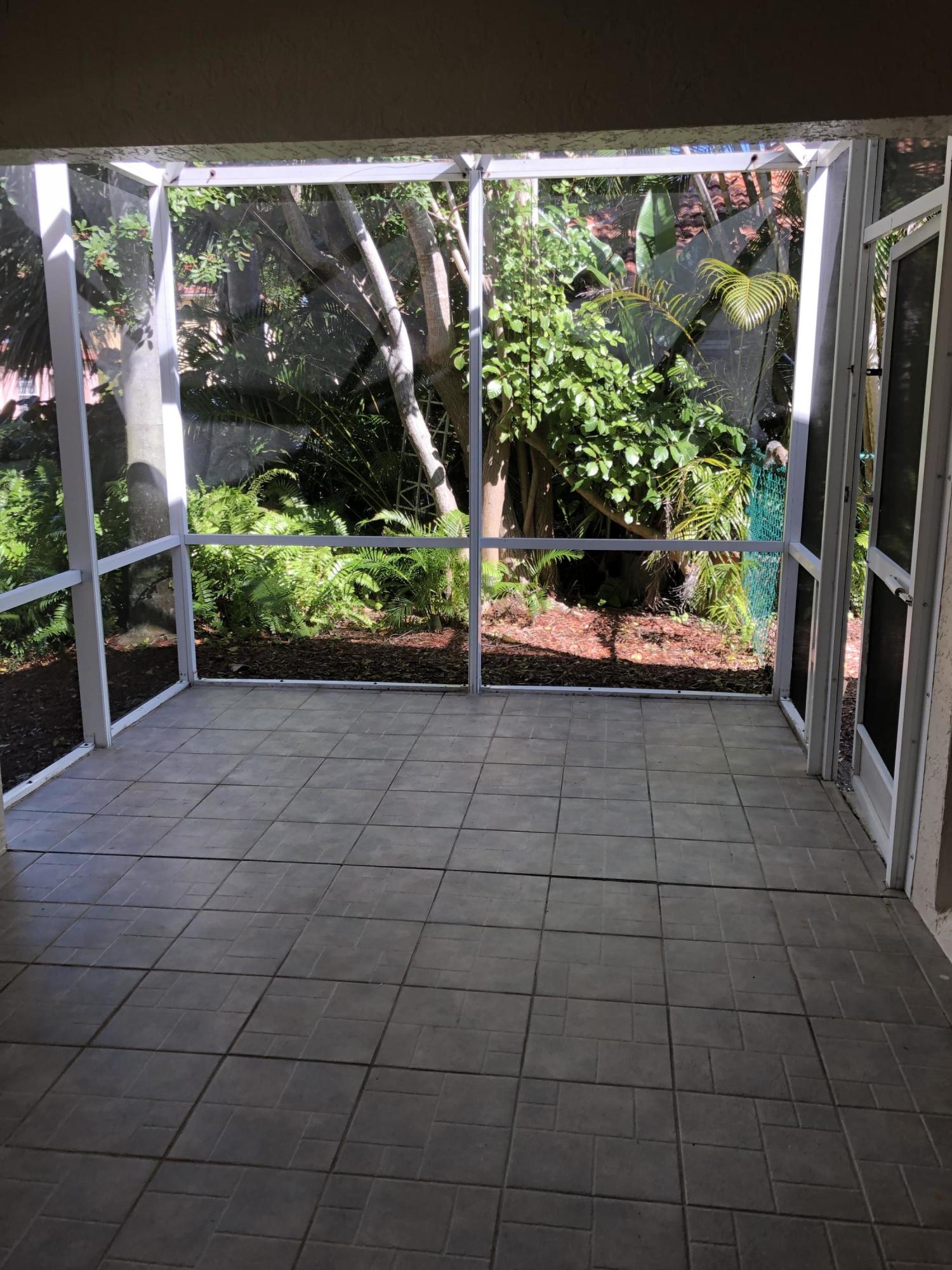 3121 Contego Lane Riviera Beach, FL 33418 - Photo 13 of 20 screen in patio