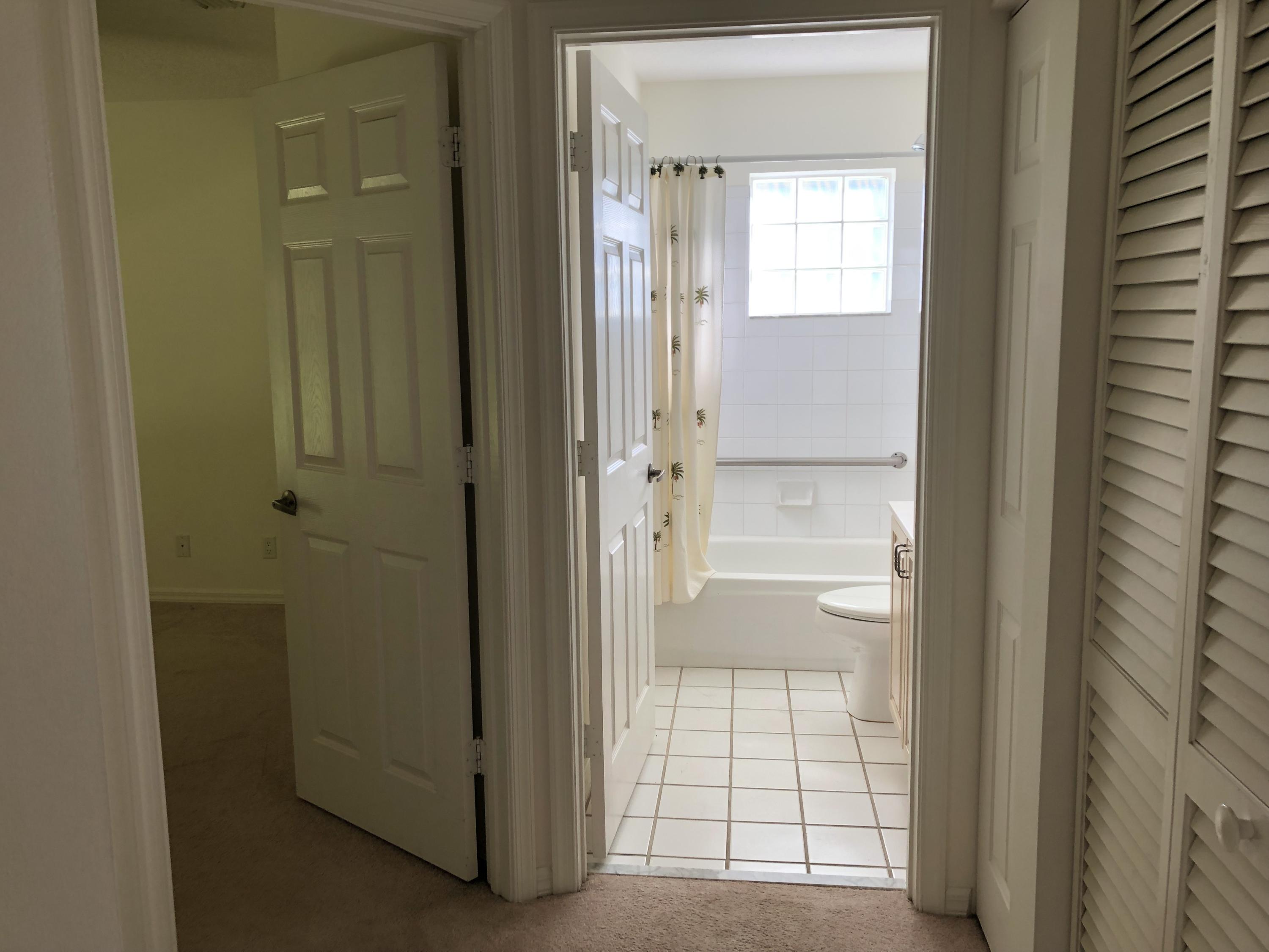 3121 Contego Lane Riviera Beach, FL 33418 - Photo 17 of 20 2nd bathroom