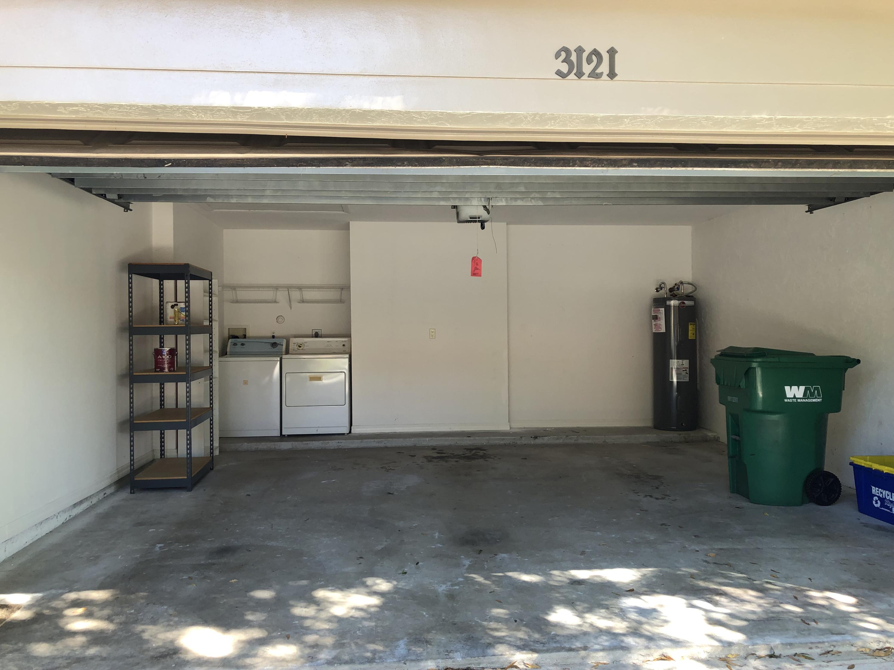3121 Contego Lane Riviera Beach, FL 33418 - Photo 20 of 20 Garage