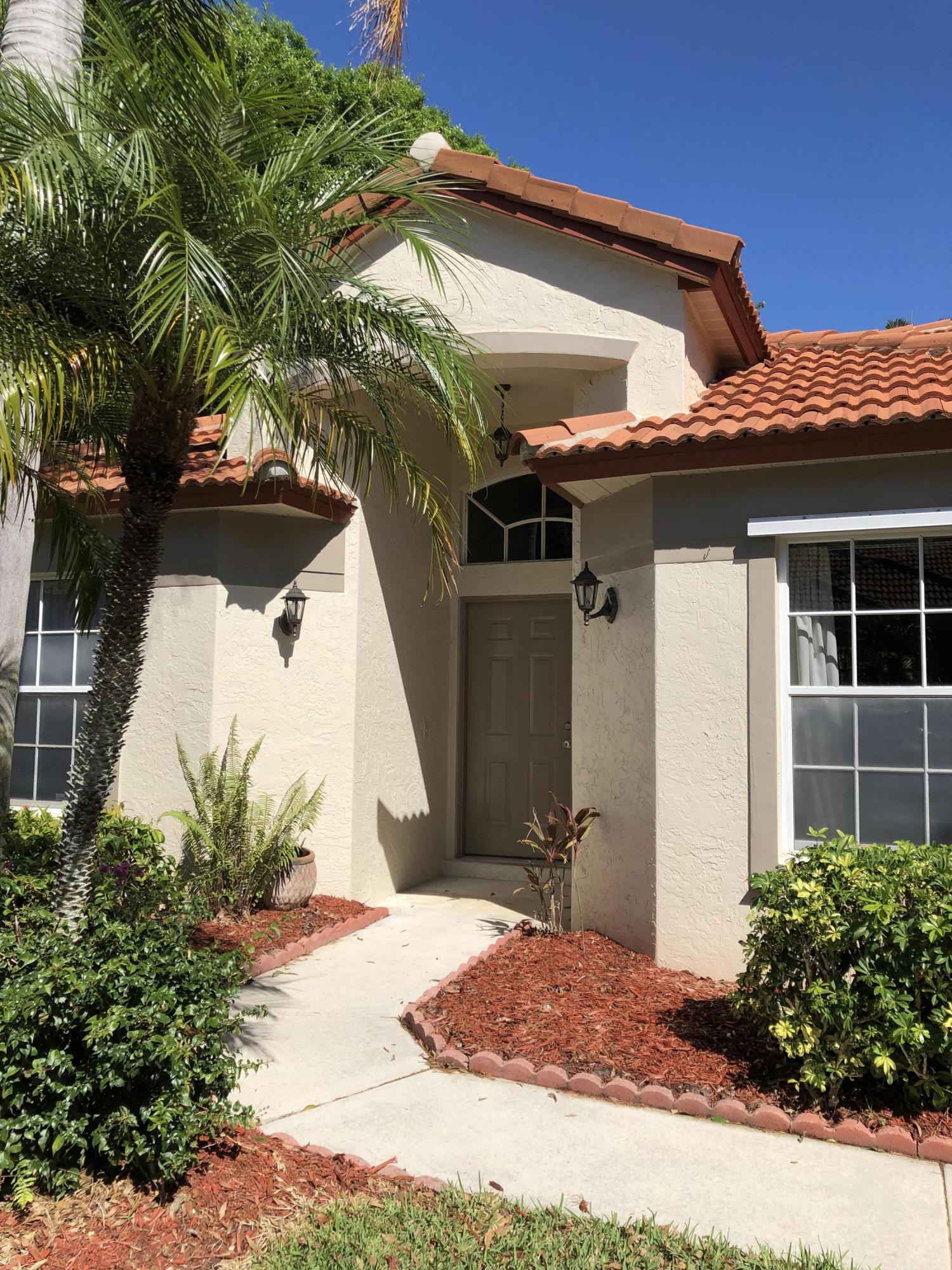 3121 Contego Lane Riviera Beach, FL 33418 - Photo 2 of 20 Front entry