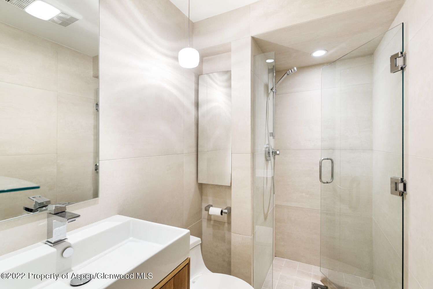 100 North 8th Street, Unit 20 Aspen, CO 81611 - Photo 17 of 18 a bathroom with a sink and a mirror