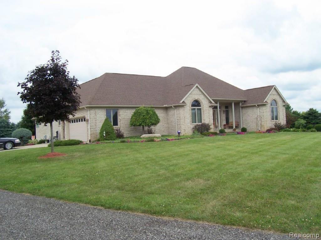 14470 Hough Road Allenton, MI 48002 - Photo 2 of 39 side view showing garage