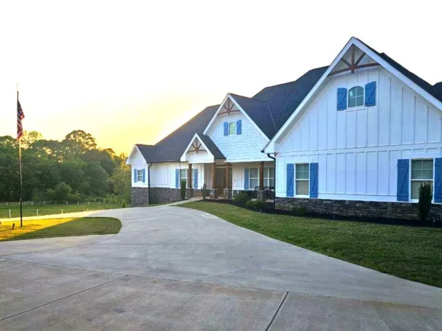 a house view with a outdoor space