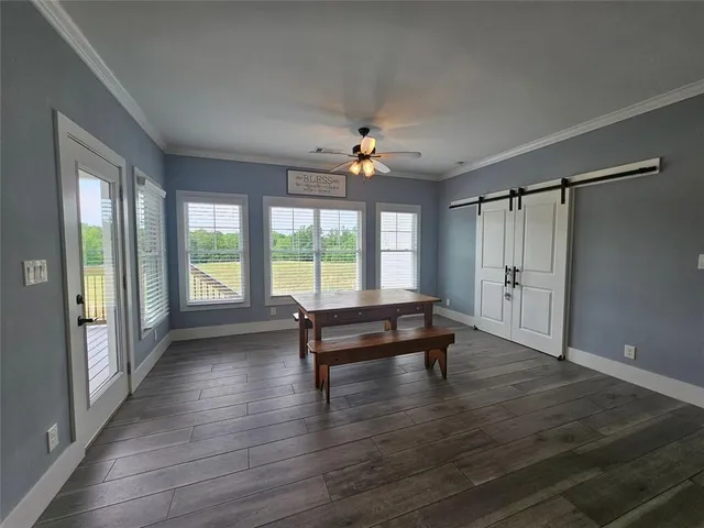 a bathroom with a sink a large mirror and a shower