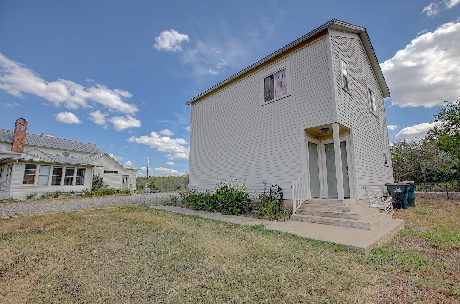 11228 Parsons Road Manor, TX 78653 - Photo 32 of 40 a front view of a house with a yard