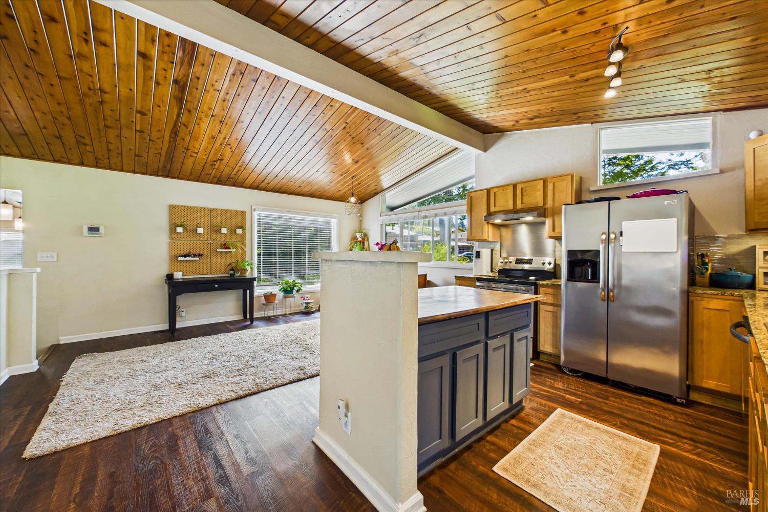 2305 Harris Street Eureka, CA 95503 - Photo 12 of 31 a kitchen with refrigerator and cabinets