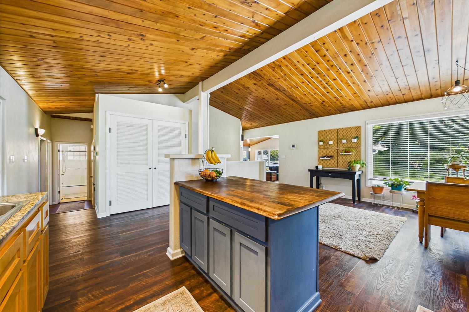 2305 Harris Street Eureka, CA 95503 - Photo 15 of 31 a dining hall with stainless steel appliances granite countertop a sink and wooden floors