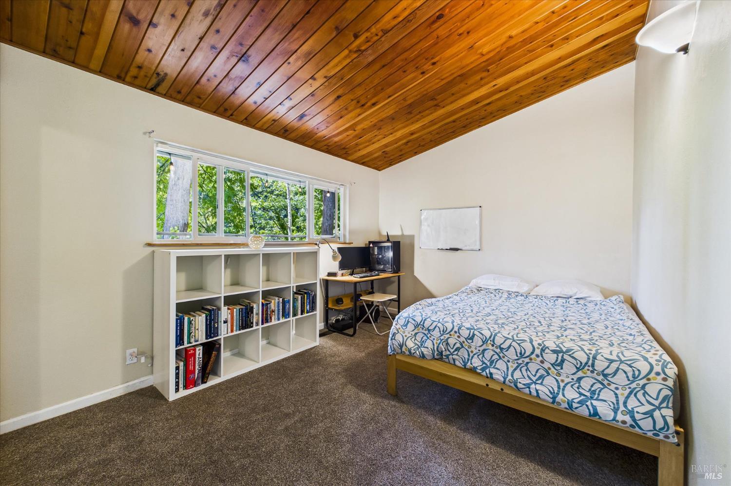 2305 Harris Street Eureka, CA 95503 - Photo 23 of 31 a bedroom with bed and a large window