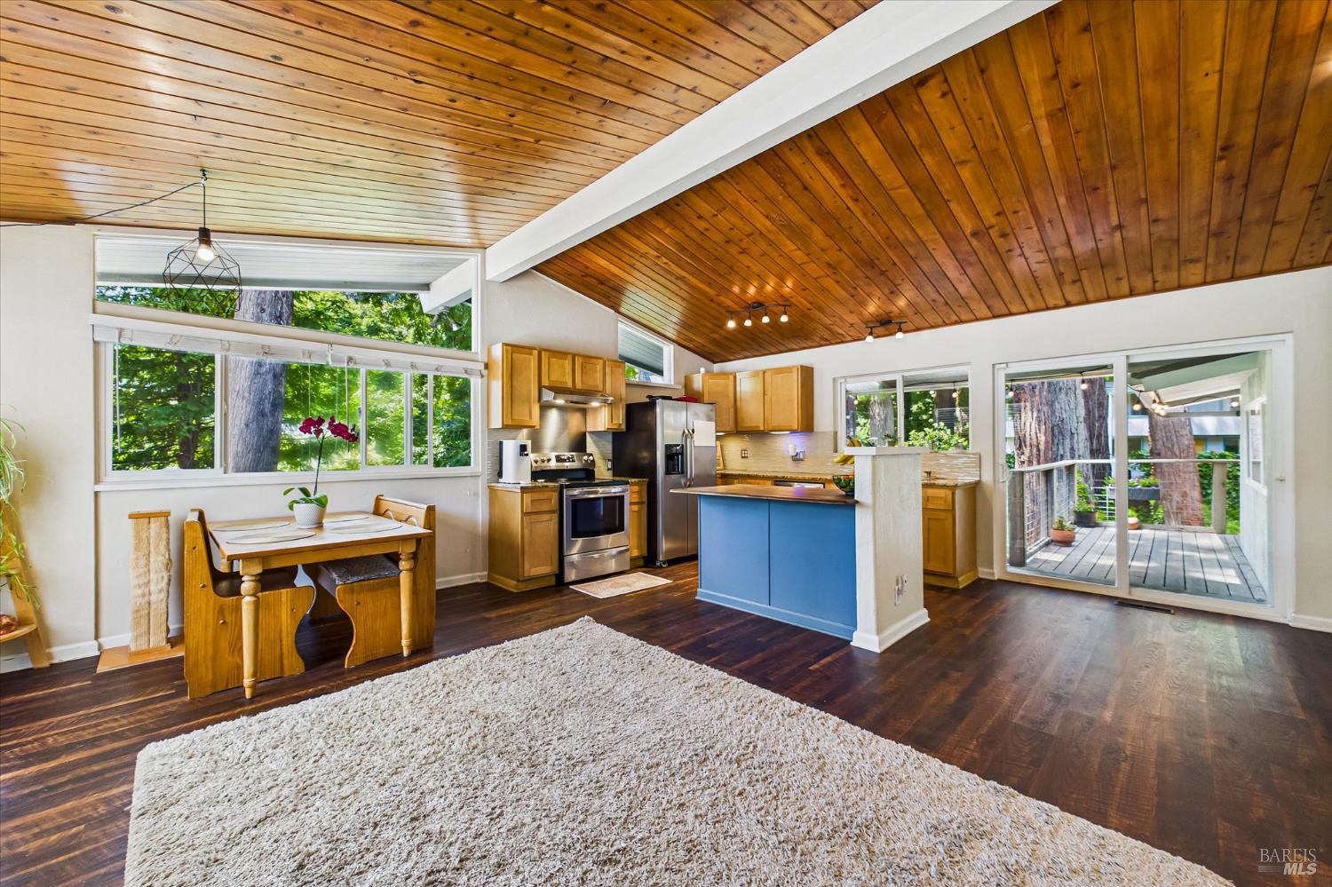 2305 Harris Street Eureka, CA 95503 - Photo 8 of 31 a view of a kitchen with wooden floor and electronic appliances
