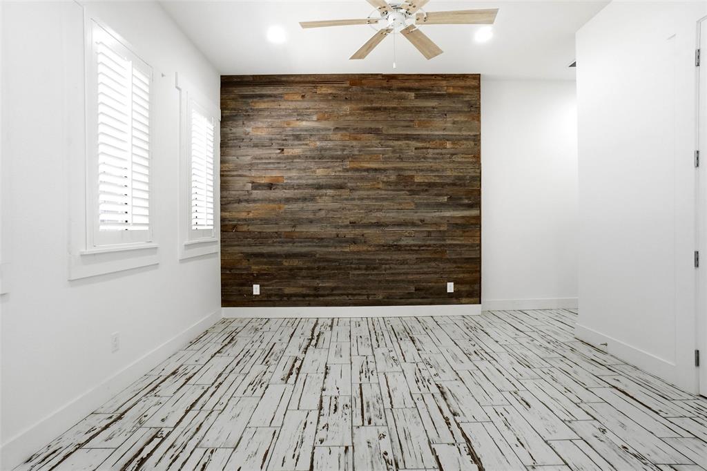 13240 Briar Road Azle, TX 76020 - Photo 14 of 39 a view of wooden floor in an empty room
