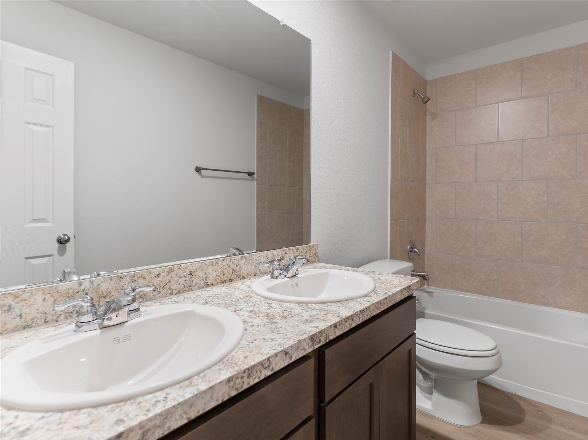 306 North Orange Street Sweeny, TX 77480 - Photo 28 of 30 Spacious upstairs bathroom with elegant double vanity.