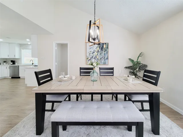 a view of a dining room with furniture