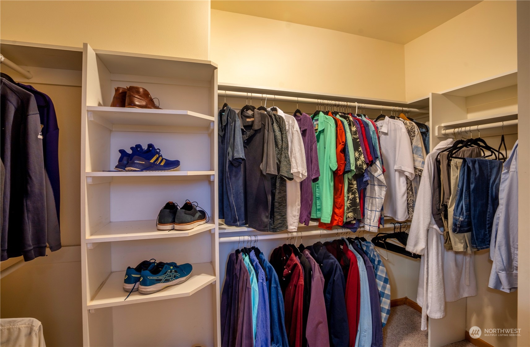 715 Palo Alto Road Sequim, WA 98382 - Photo 20 of 40 a view of walk in closet with clothes and shoes