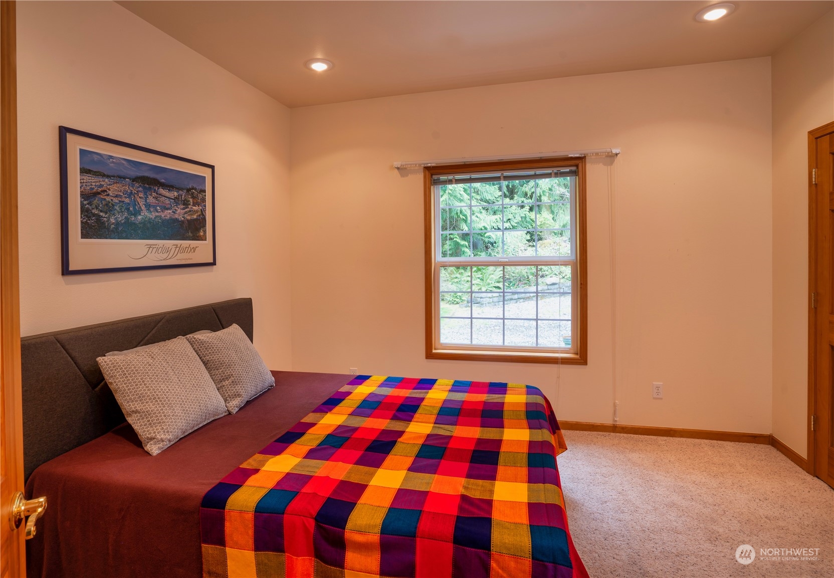 715 Palo Alto Road Sequim, WA 98382 - Photo 22 of 40 a bedroom with a bed and a window