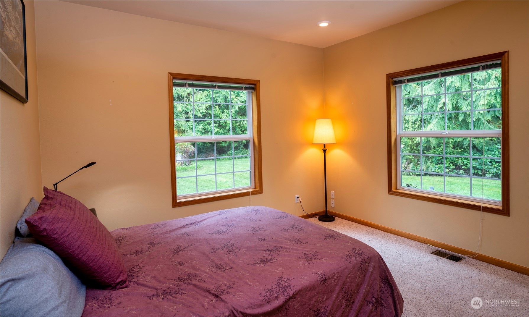 715 Palo Alto Road Sequim, WA 98382 - Photo 23 of 40 a bedroom with a bed and a window
