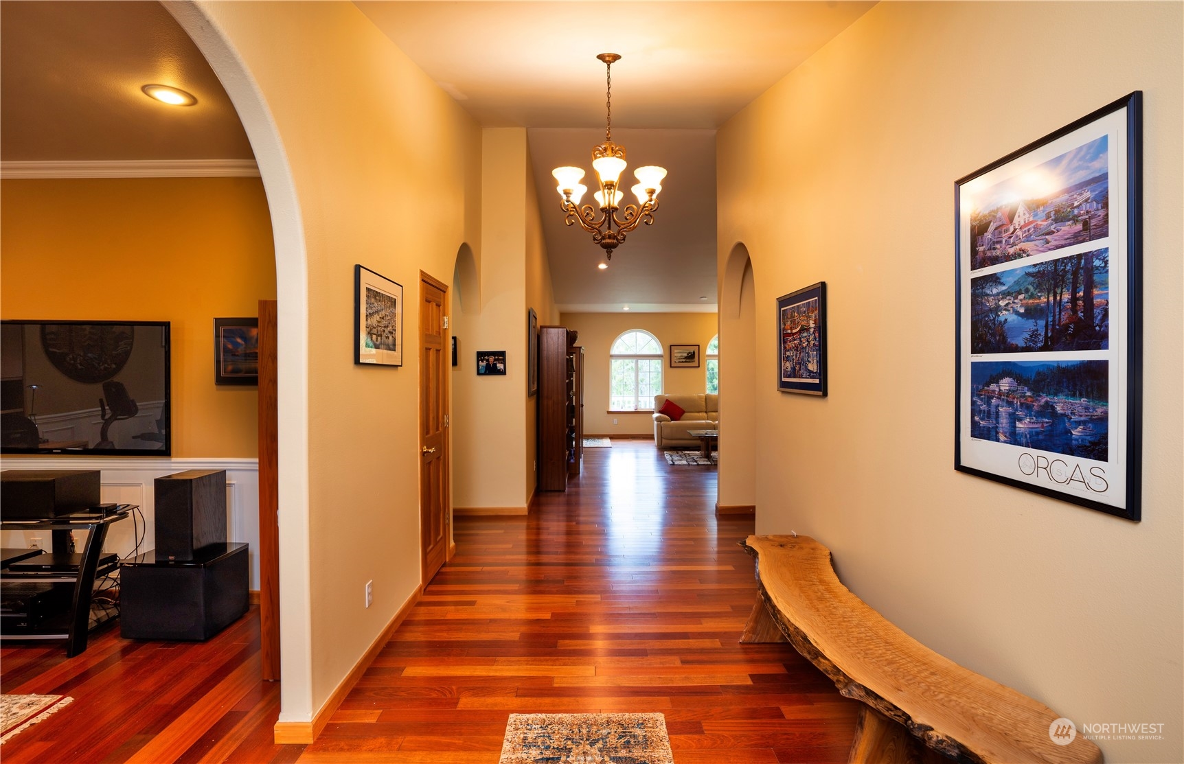 715 Palo Alto Road Sequim, WA 98382 - Photo 3 of 40 a view of a hallway with wooden floor and cabinet