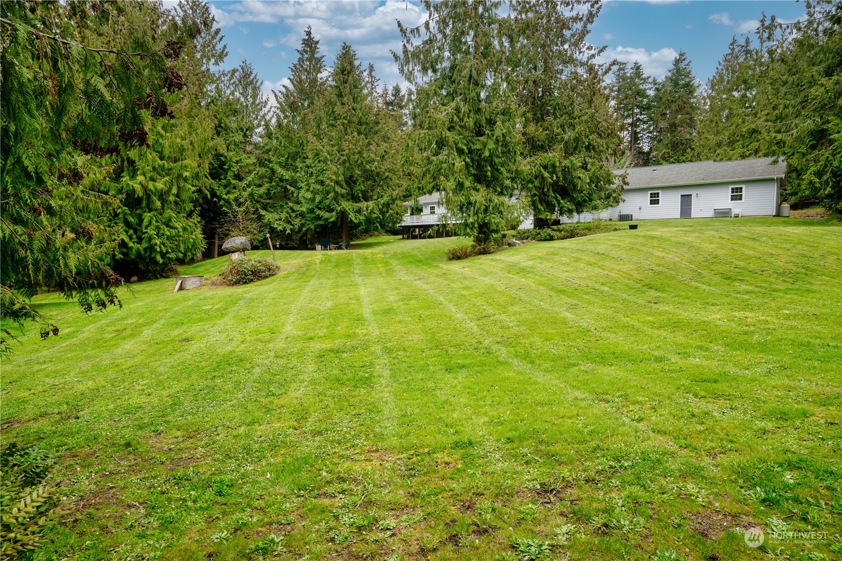 715 Palo Alto Road Sequim, WA 98382 - Photo 34 of 40 a view of a house with a yard