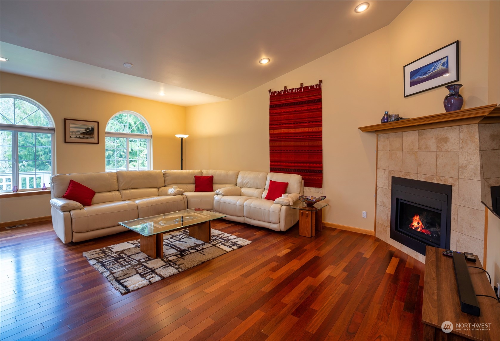 715 Palo Alto Road Sequim, WA 98382 - Photo 6 of 40 a living room with furniture and a fireplace