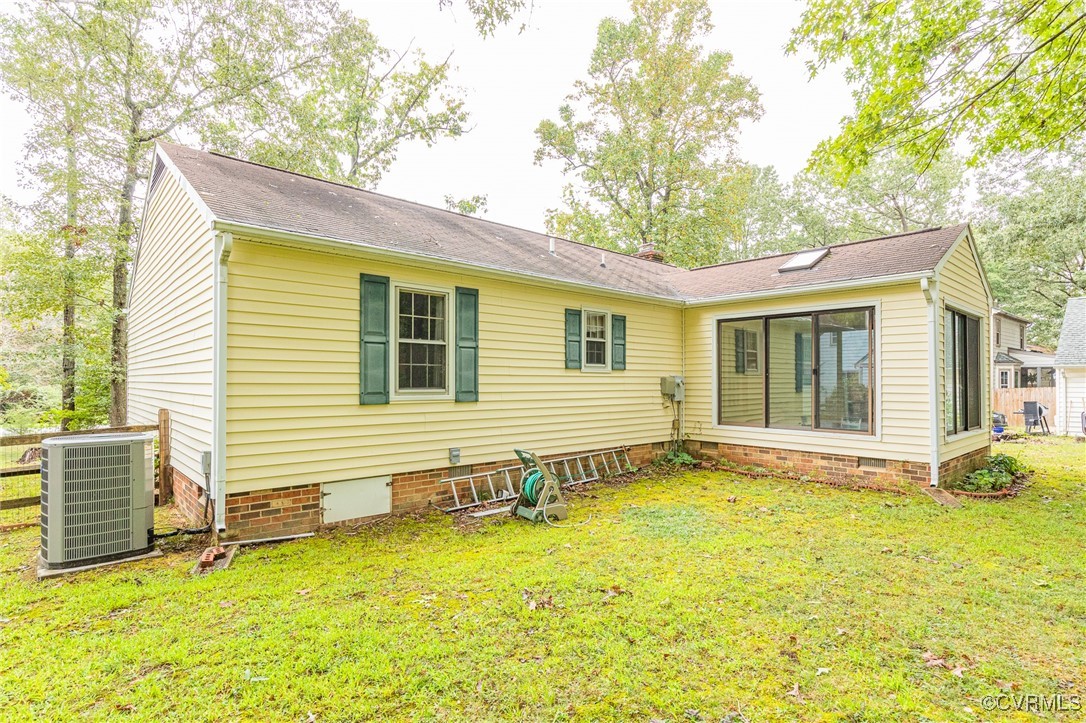 11007 Belvoir Road Chester, VA 23831 - Photo 8 of 40 a view of a house with a backyard