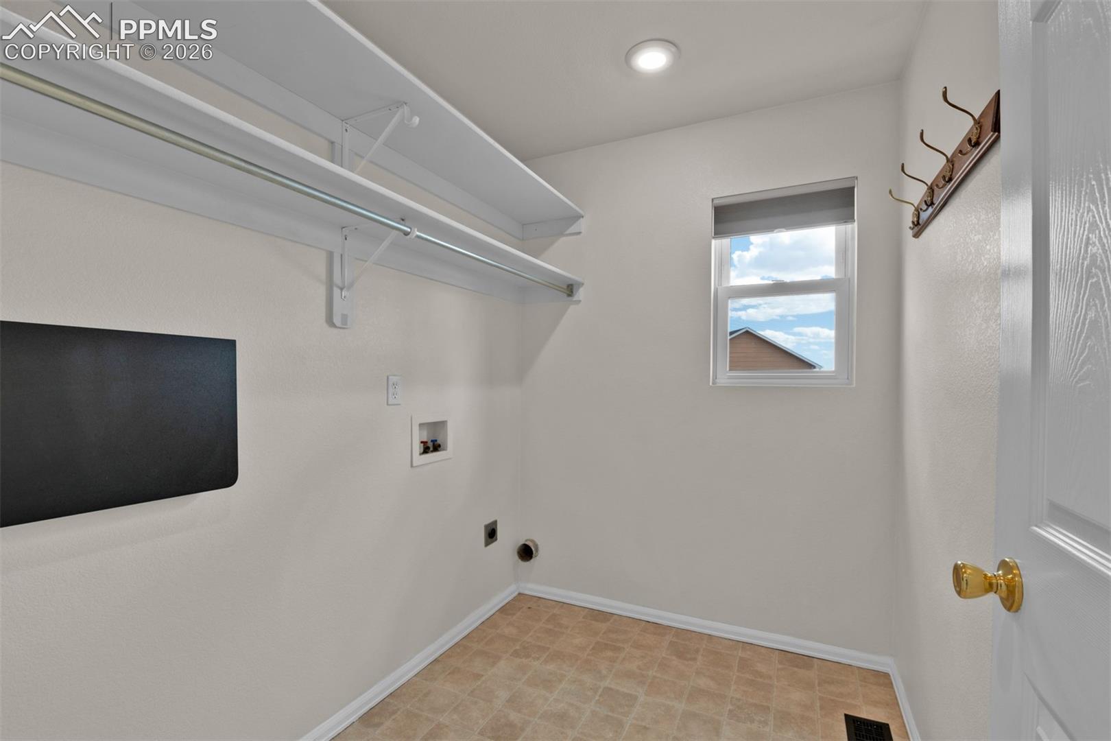 8407 Weiscamp Road Peyton, CO 80831 - Photo 17 of 49 Main Level Laundry Room