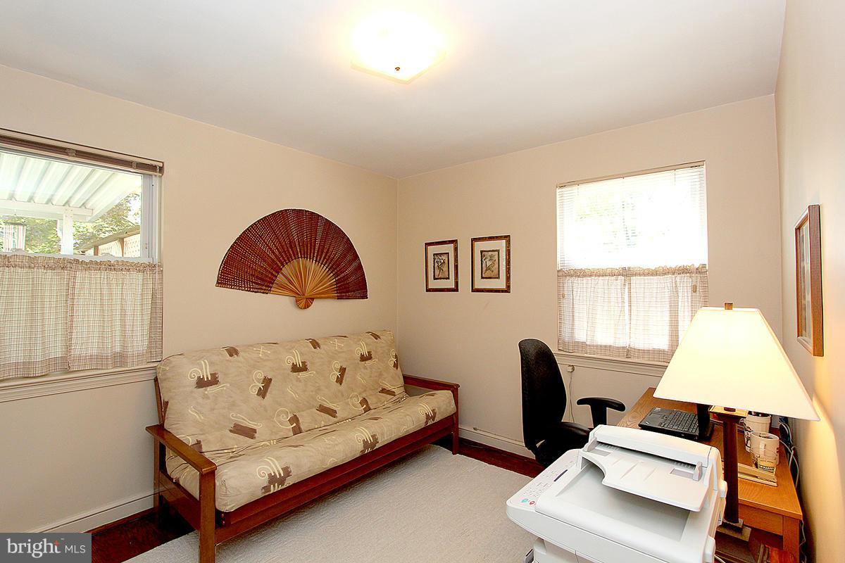 10011 Portland Road Silver Spring, MD 20901 - Photo 15 of 24 2nd bedroom offers 2 windows, hardwood floors