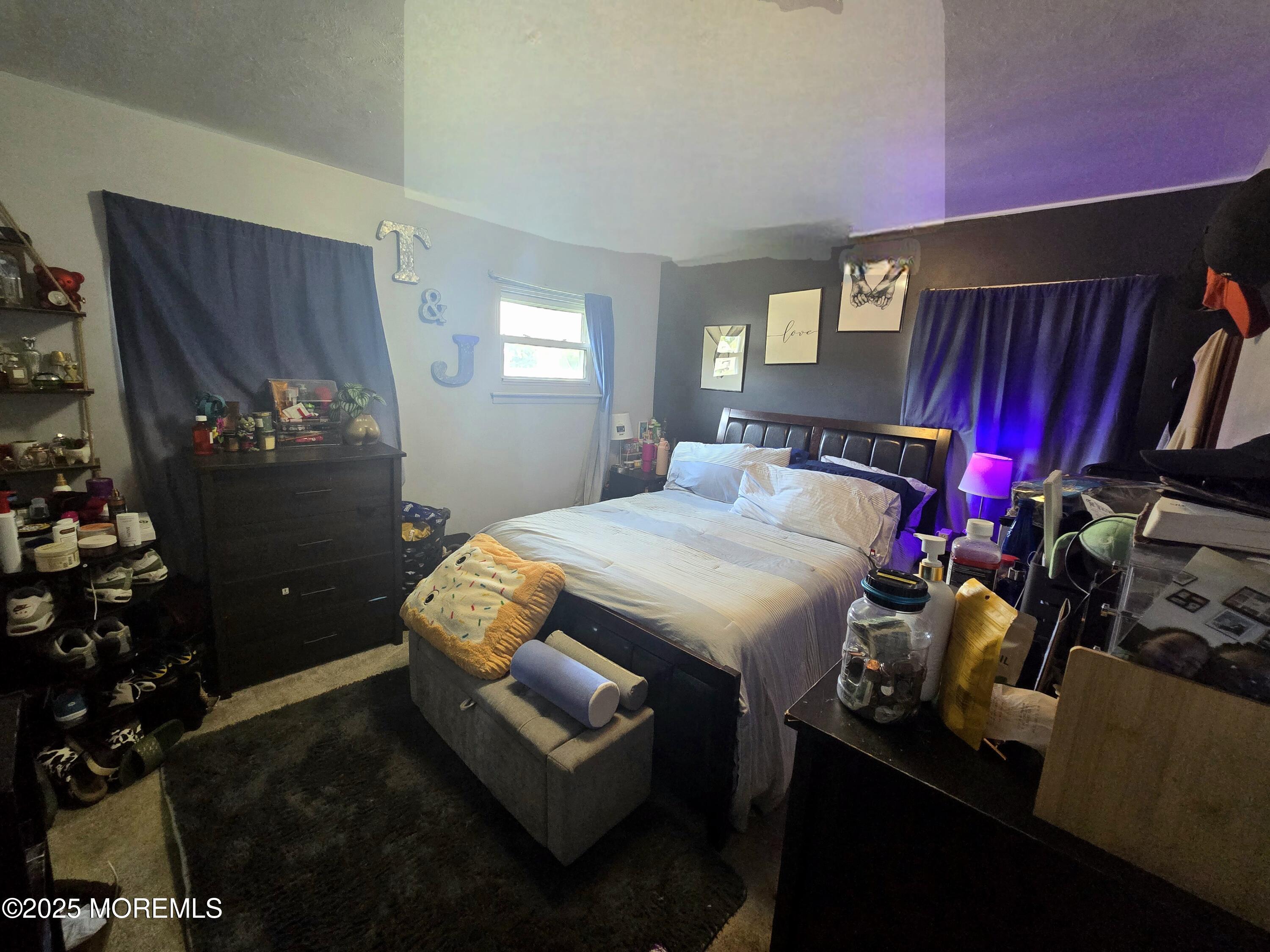 11 Trident Boulevard Neptune Township, NJ 07753 - Photo 14 of 25 a bedroom with a bed closet and window