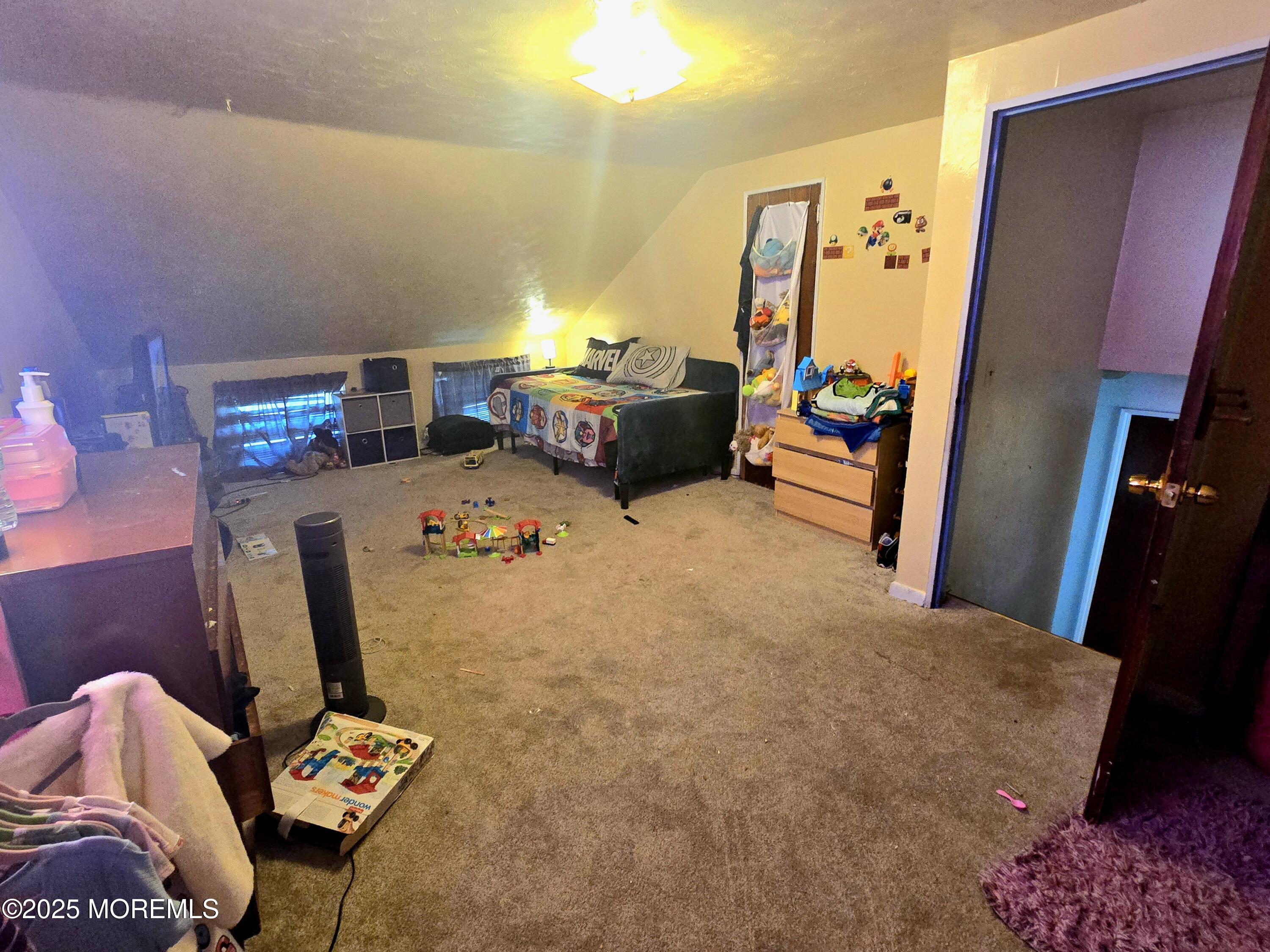 11 Trident Boulevard Neptune Township, NJ 07753 - Photo 16 of 25 a bedroom with bed and wooden floor