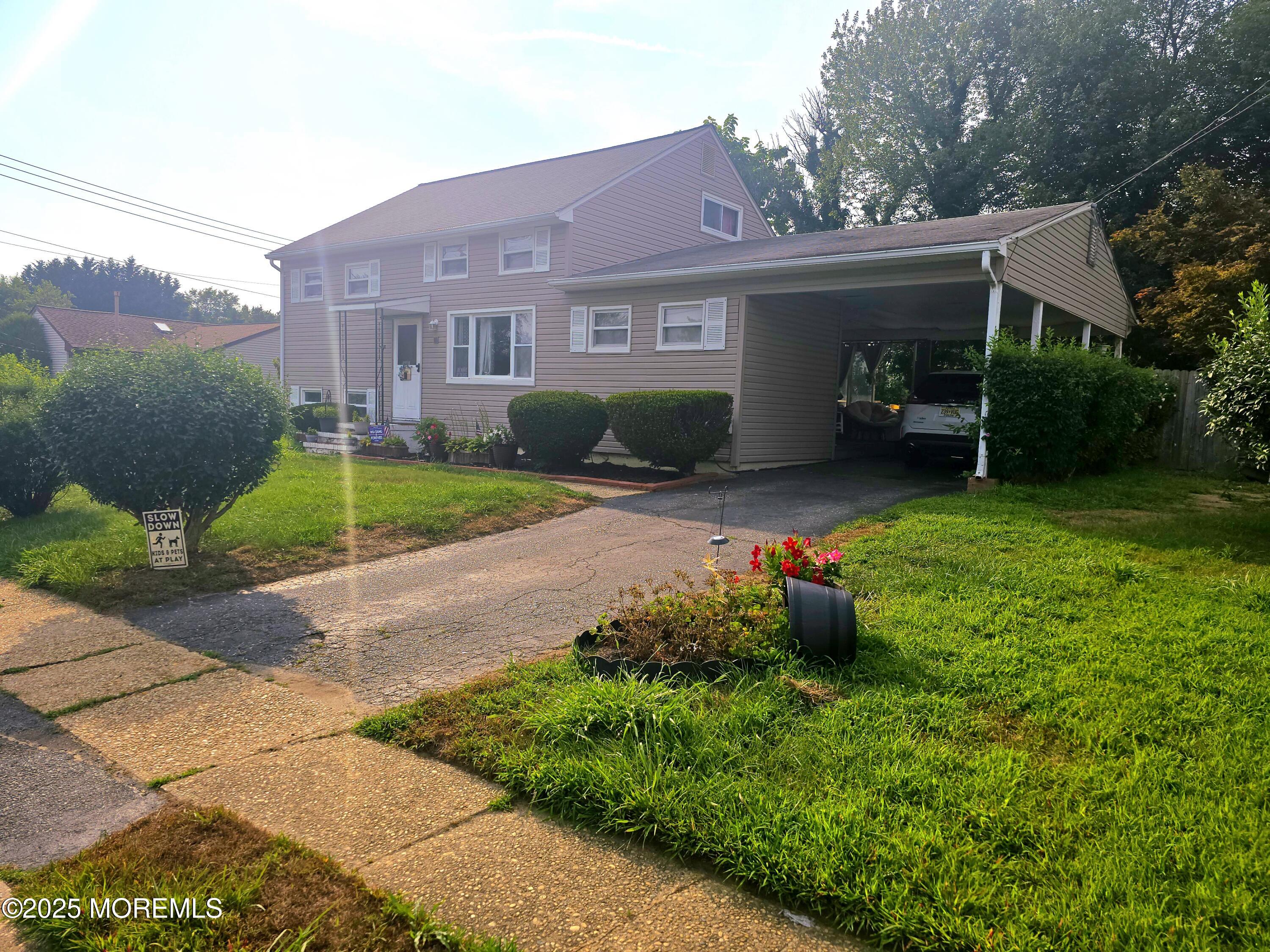 11 Trident Boulevard Neptune Township, NJ 07753 - Photo 2 of 25 a view of a house with backyard and garden