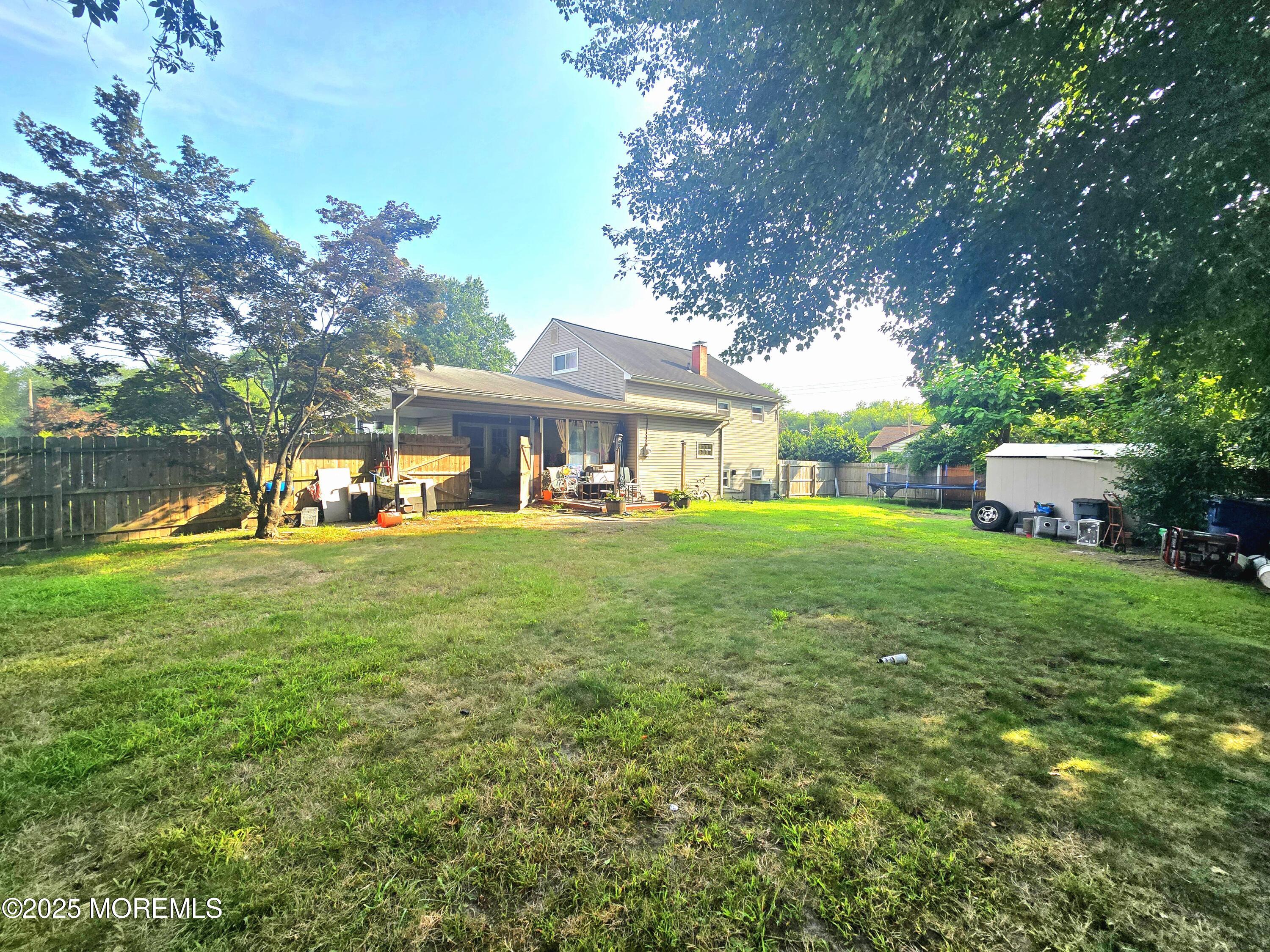 11 Trident Boulevard Neptune Township, NJ 07753 - Photo 25 of 25 a view of house that has a yard