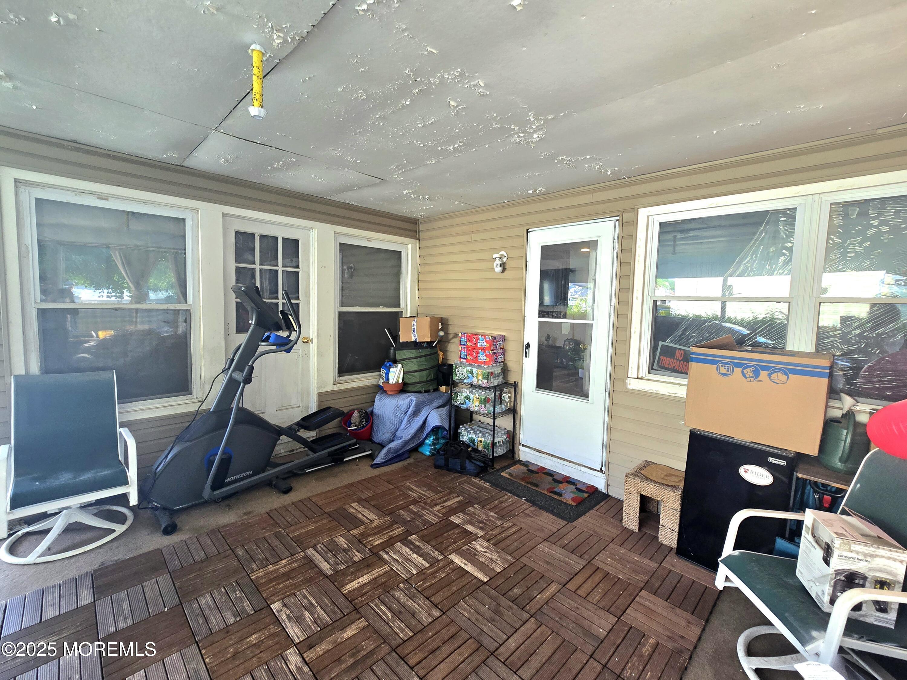 11 Trident Boulevard Neptune Township, NJ 07753 - Photo 5 of 25 a living room with furniture and a window